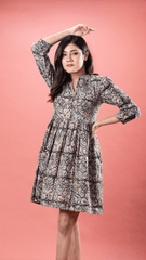 Discover chic practicality with our Kalamkari Short Dress in Paisley Blue, featuring convenient pockets. Crafted from 100% lightweight cotton, this floral print dress blends style and functionality seamlessly. Perfect for everyday wear, wash with cold water or dry clean for long-lasting beauty.