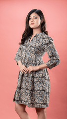 Embrace style and comfort in our Paisley Blue Kalamkari Short Dress, made from 100% lightweight cotton. Featuring floral print details and handy pockets, this cotton dress for women combines elegance with practicality. Care tips: Hand wash with cold water or dry clean.