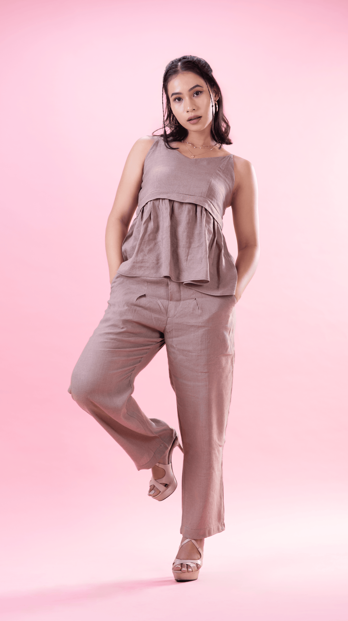 LinenLuxe Duo: Strappy peplum top and tailored linen trousers, chic and versatile outfit