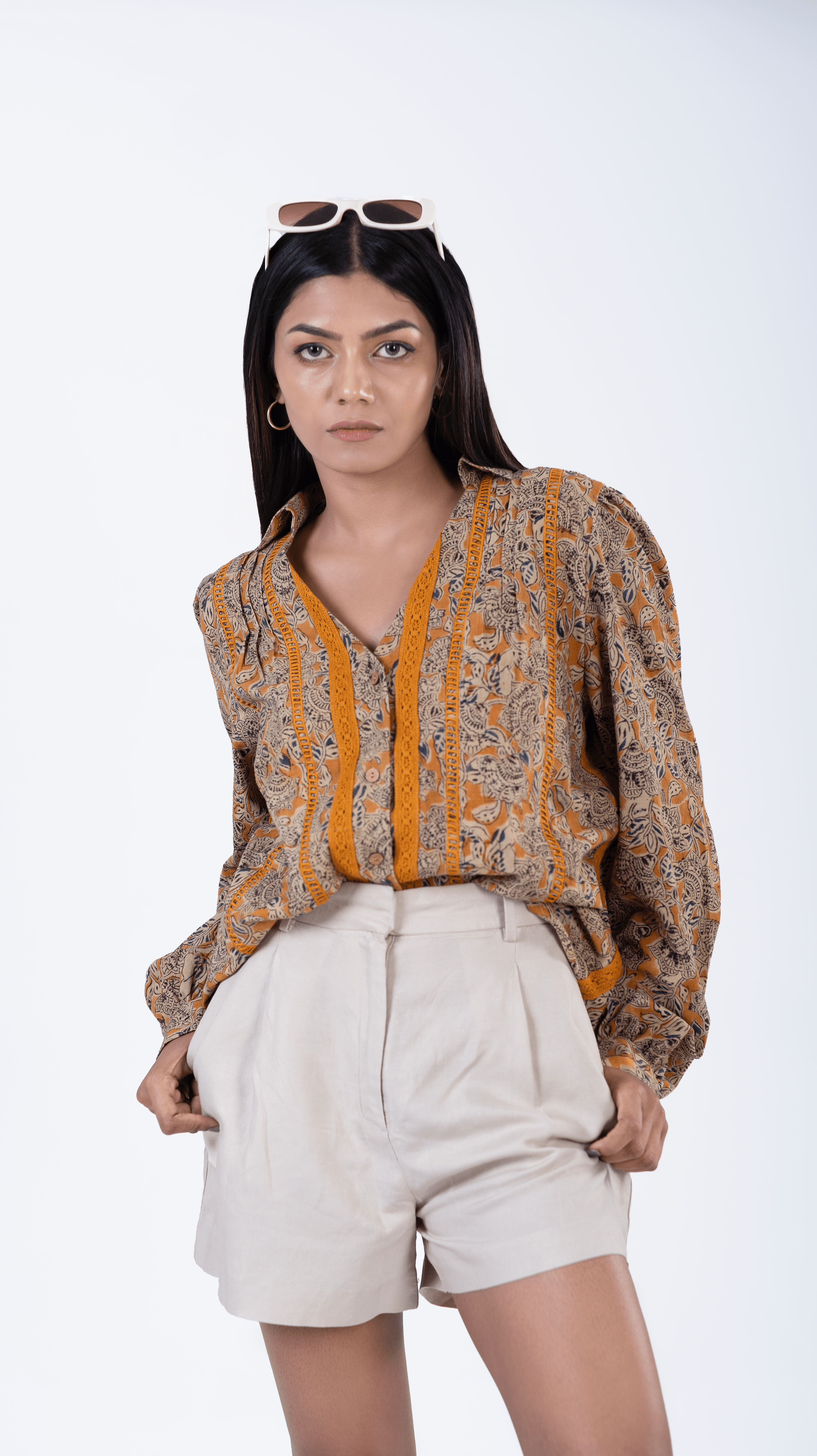 Upgrade your fashion game with the "Mustard Muse Shirt," a stylish and trendy top for women. This blouse features a vibrant yellow pop collar and a beautifully tailored fit, designed to flatter your silhouette and accentuate your neckline. Perfect for any event, from casual to formal, this versatile top is now available at a flat 50% discount. Shop now to embrace elegance and sophistication in your everyday style.