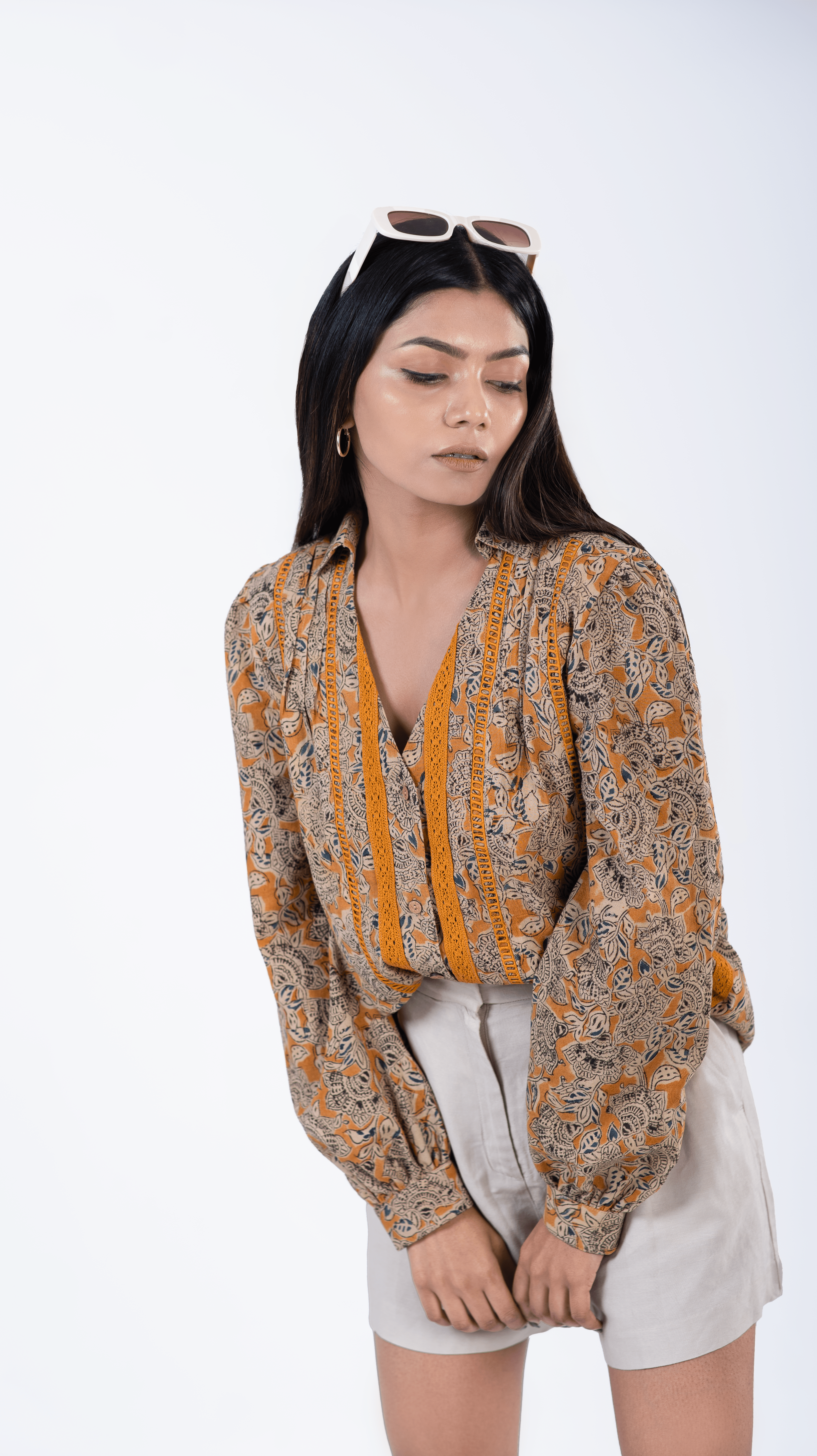 Discover the allure of our "Mustard Muse Shirt," a trendy and stylish top for women seeking a vibrant look. With its eye-catching yellow pop collar and tailored fit, this blouse enhances your silhouette and flatters every curve. Ideal for both casual outings and special occasions, this versatile top is now available at an exclusive 50% discount. Shop now to add a pop of color and sophistication to your wardrobe.