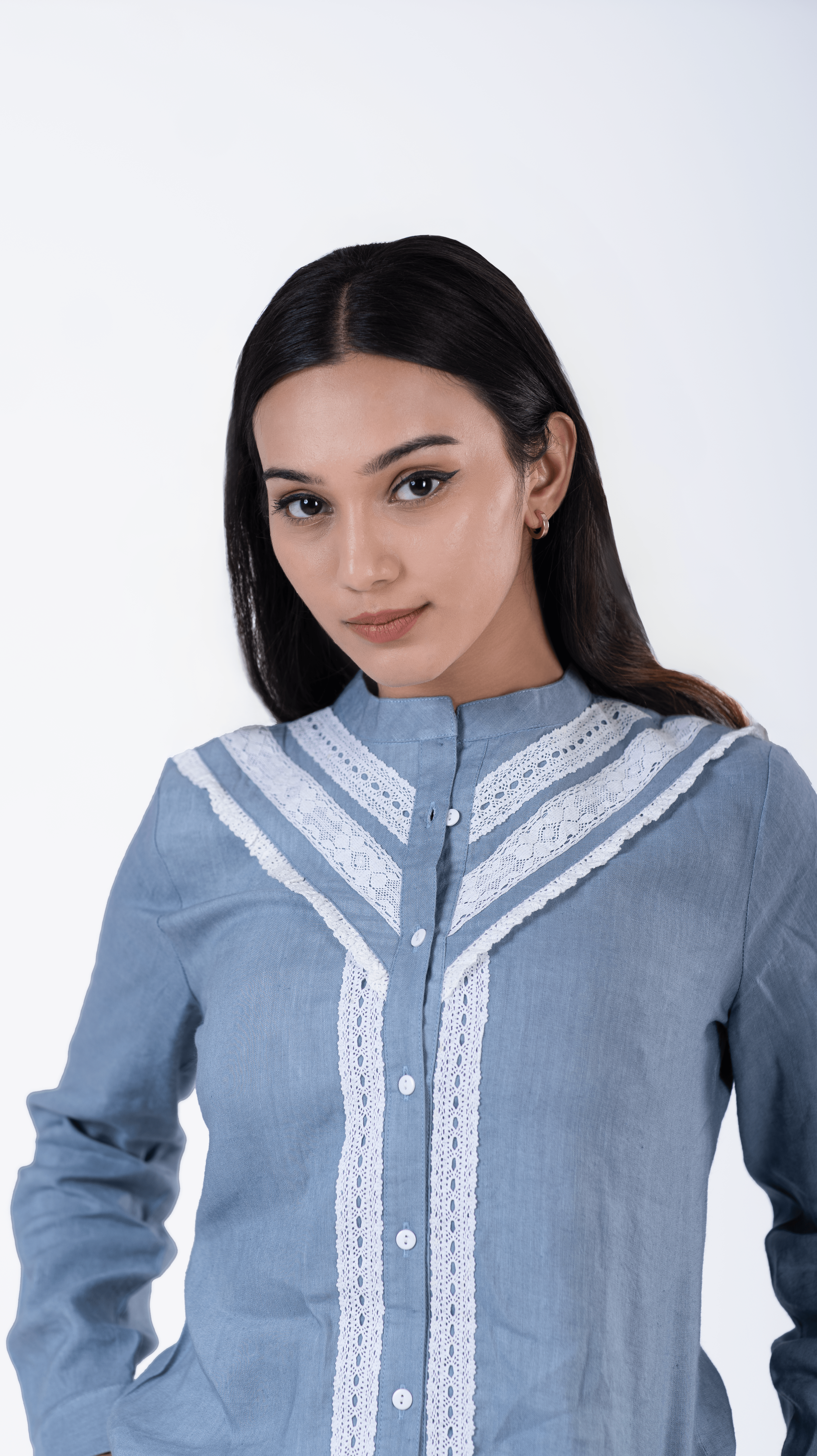 Discover the allure of our Mod Lace Fusion Shirt, where contemporary fashion meets classic charm. This women's top boasts a sleek design enhanced by intricate lace accents, ensuring a look that's as stylish as it is sophisticated. Shop now to find the perfect fusion of trend-setting design and everyday comfort in our selection of ladies tops.