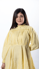 The LaceWhisper Dress is a beautiful yellow midi sunflower dress for women, featuring a delicately designed neckline and intricate lace detailing. With a relaxed fit and playful elegance, this stylish yellow dress is ideal for casual occasions, making it a perfect choice for women's yellow sundresses.