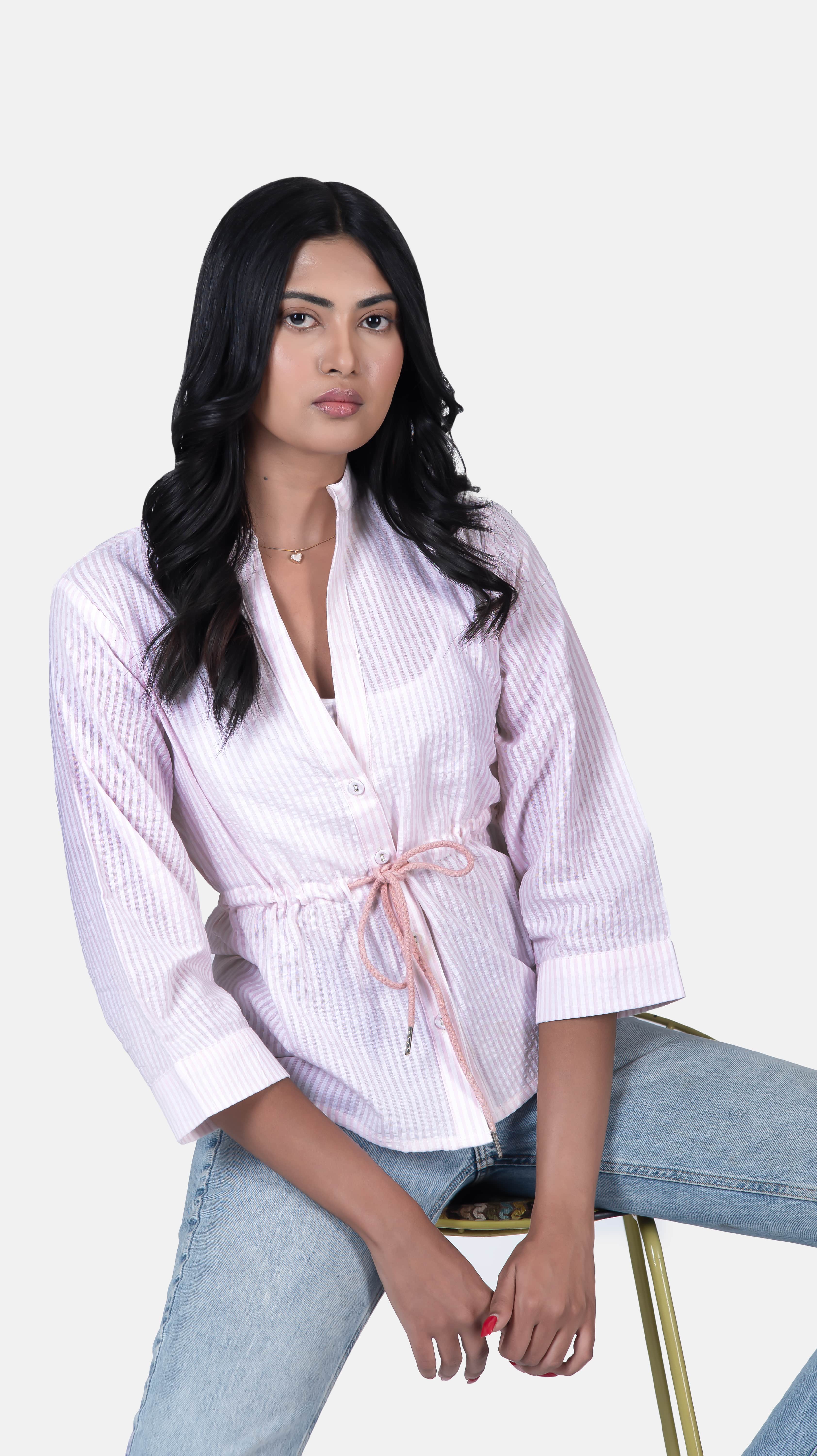 Discover the charm of our "Knot-Detail Shirt," designed with baby pink stripes and a chic knot detail that adds a touch of sophistication to any outfit. This trendy women's top is ideal for enhancing your wardrobe with its versatile and stylish appeal. Enjoy our 50% off mega discount and limited stock on this fashionable knot-detail blouse. Shop now and elevate your everyday look with this must-have piece.