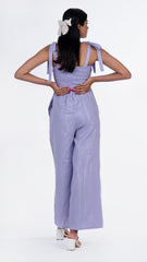 Elevate your wardrobe with this women's jumpsuit, featuring exquisite knot detailing and made from premium cotton fabric. It offers elegance and comfort, perfect for casual outings or formal events. This versatile jumpsuit stands out in the realm of women's jumpsuits, capturing attention and catering to diverse tastes and preferences.