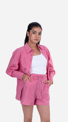 Fuchsia striped shirt with dramatic voluminous sleeves, made of 100% cotton seersucker, ideal for a standout wardrobe piece