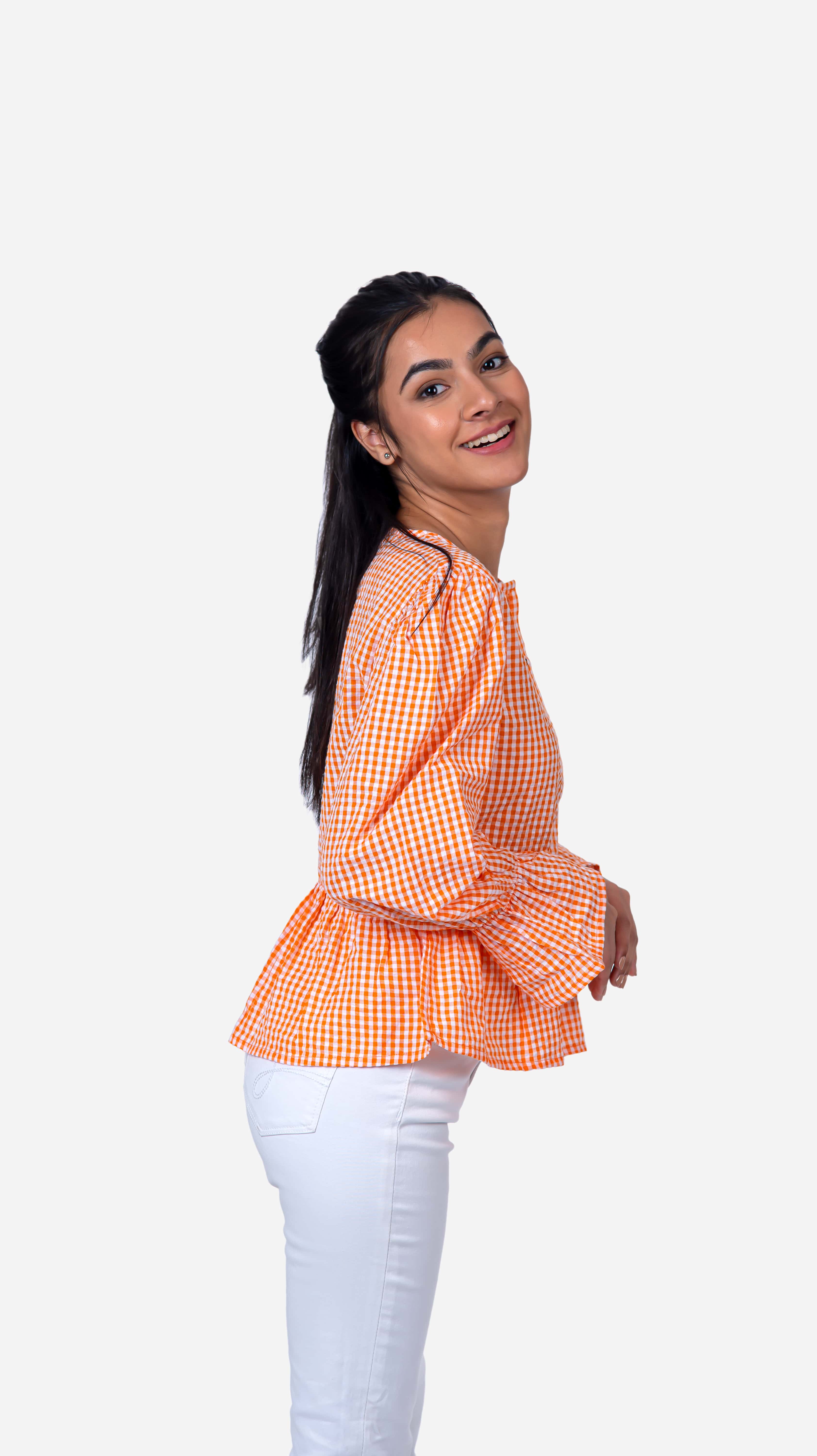 Discover the perfect blend of style and sophistication with our "Checkered Shirt - Rost Orange," designed for the modern woman. Featuring a trendy checkered pattern in a striking rost orange hue, this checkered blouse is perfect for any occasion, from casual outings to office wear. Enjoy up to 50% off on this versatile and elegant top, crafted to elevate your wardrobe with its chic design and comfortable fit. Shop tops online now and save.