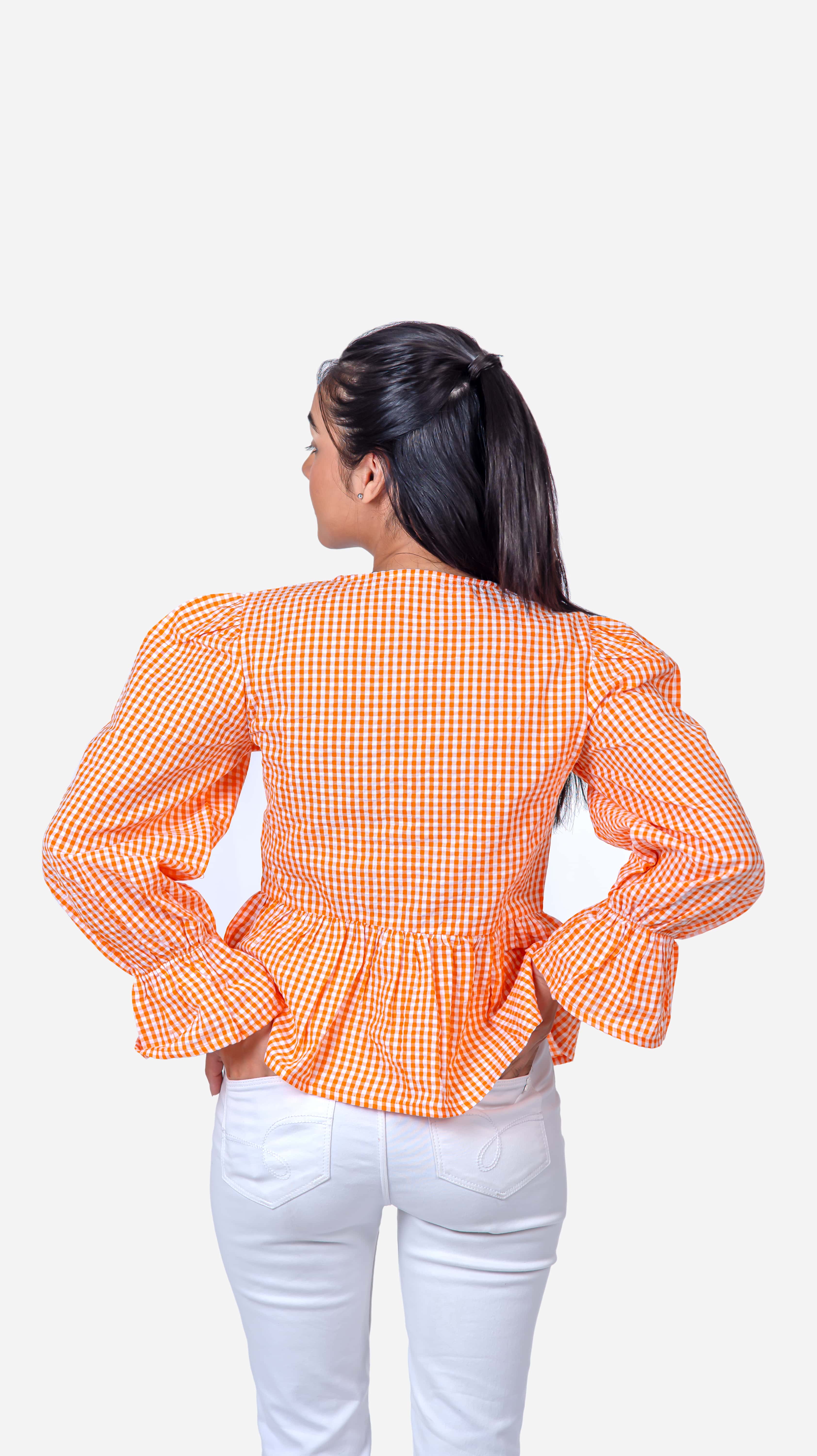 Upgrade your wardrobe with the "Checkered Shirt - Rost Orange," a must-have for any fashion-forward woman. Featuring a chic checkered pattern and a bold rost orange hue, this checkered top is perfect for all occasions. Its stylish design and comfortable fit make it a versatile addition to your closet. Don't miss out on the chance to unlock savings of up to 50% on this elegant checkered blouse. Shop tops online now and enhance your style effortlessly.