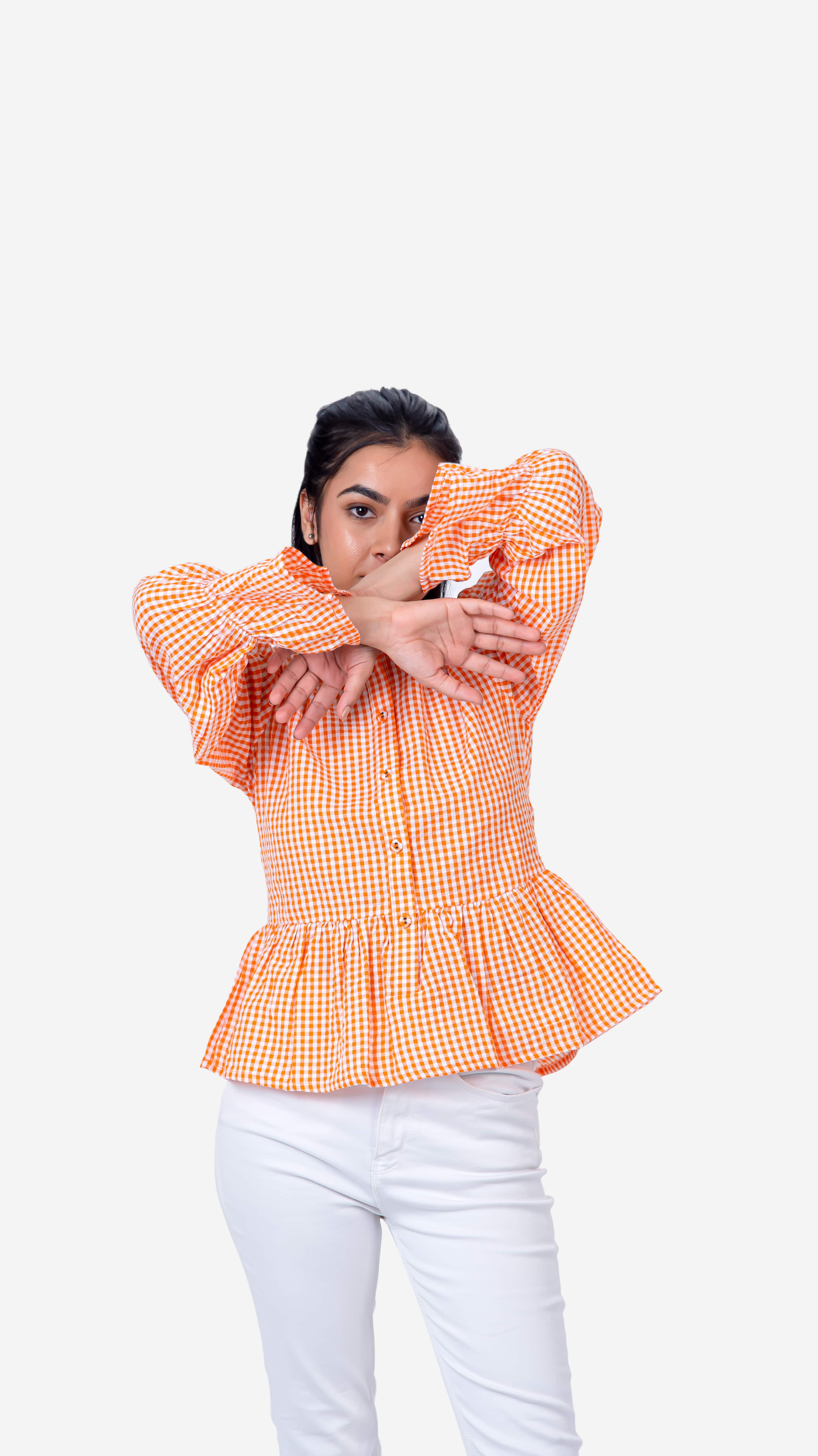 Embrace a stylish look with our "Checkered Shirt - Rost Orange," a trendy top designed to elevate your wardrobe. This women's blouse features a fashionable checkered pattern in a vibrant rost orange shade, perfect for any occasion. From casual get-togethers to formal events, this elegant checkered shirt offers versatility and sophistication. Enjoy up to 50% off on this chic piece when you shop online now. Upgrade your collection today with this must-have blouse.